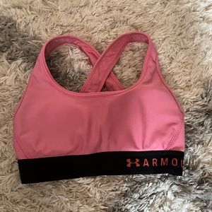 Pink Under Armour bra in a size extra small. Good condition and barely worn.